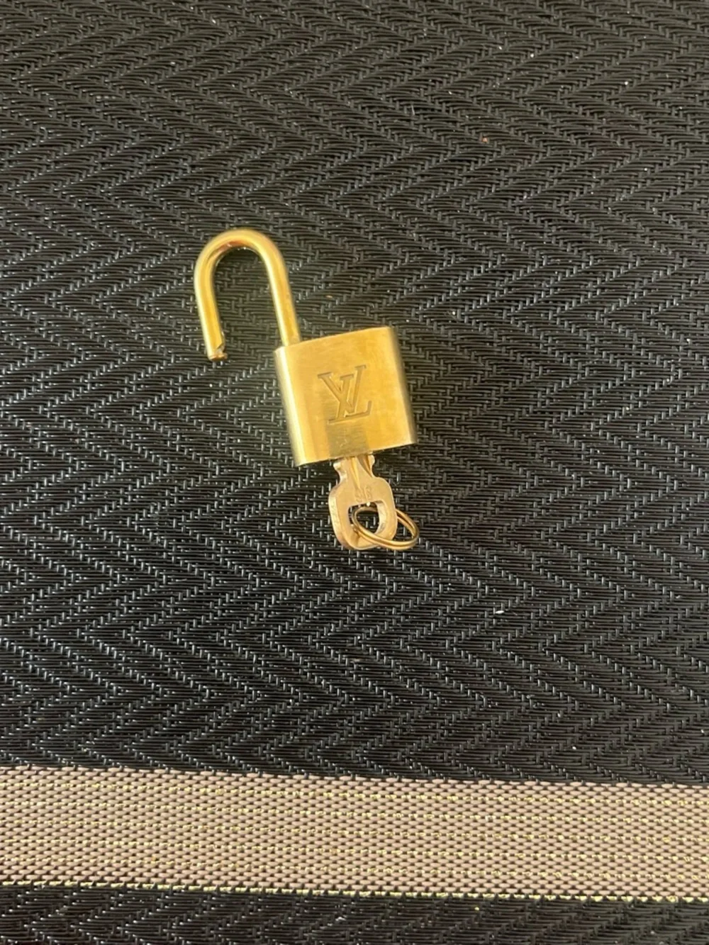 Louis Vuitton compact gold